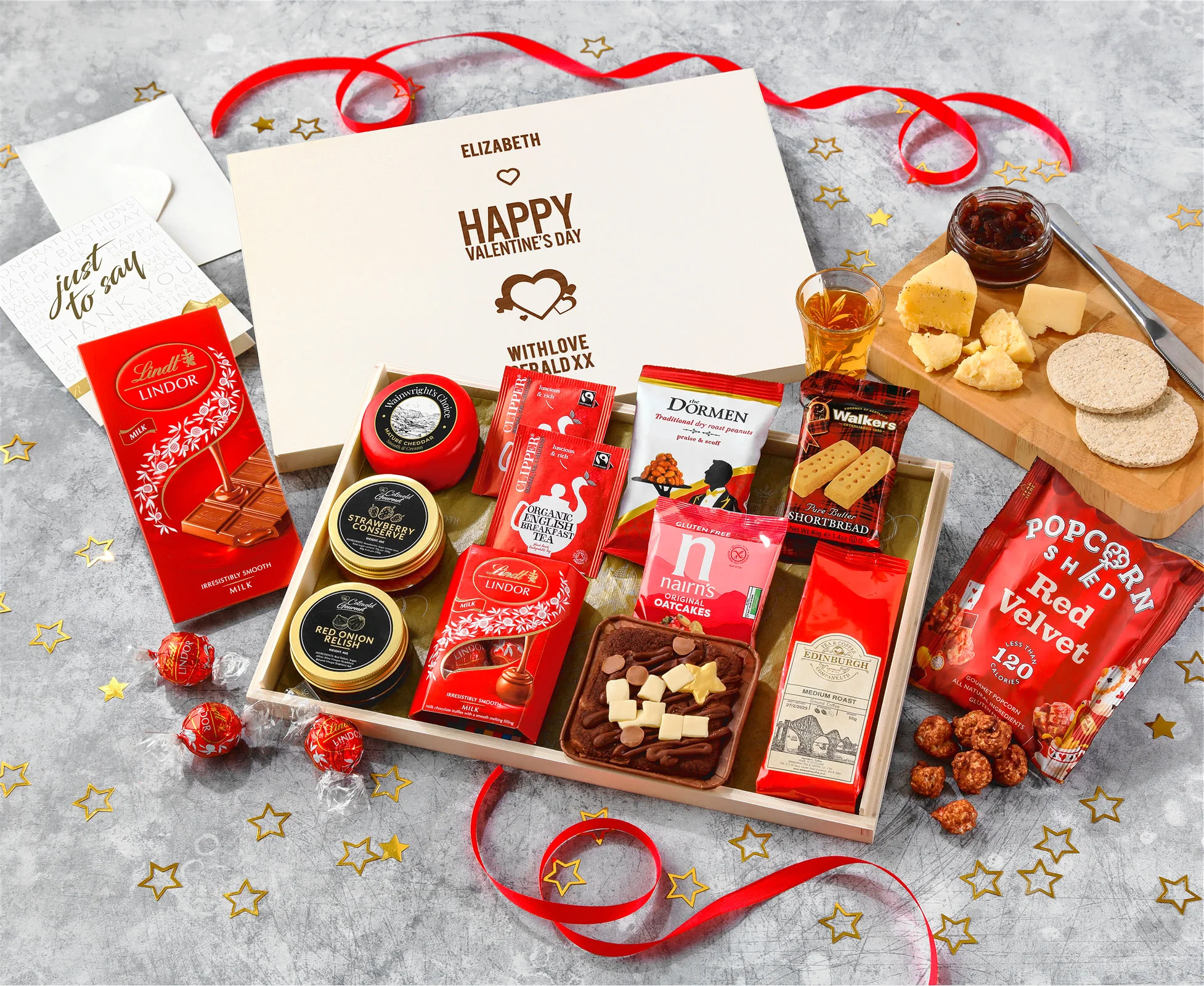 A charmingly low-cost letterbox gift box from Regency Hampers, with chocolate, cakes, cheeses and other treats